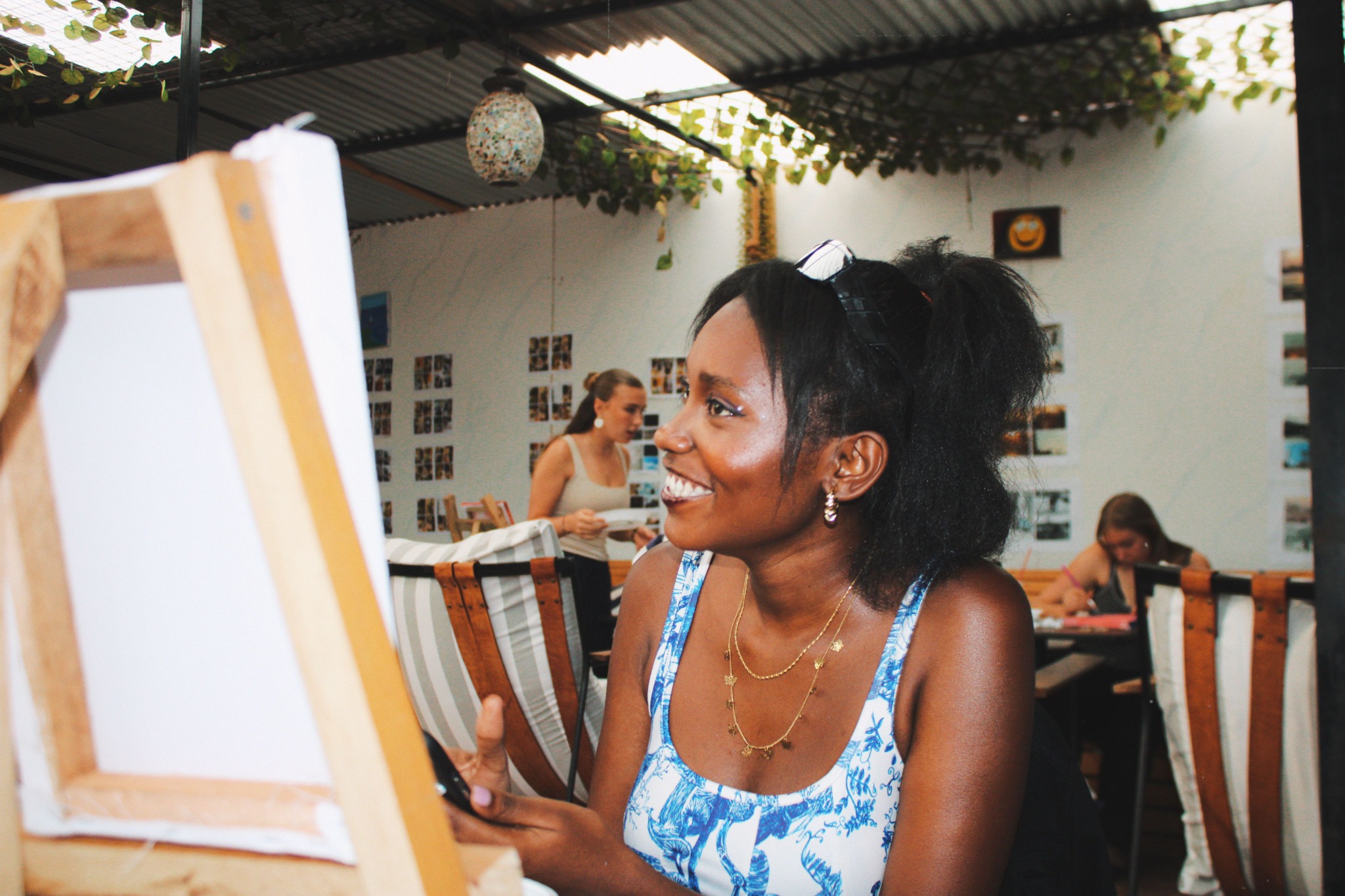 A woman enjoying a painting class